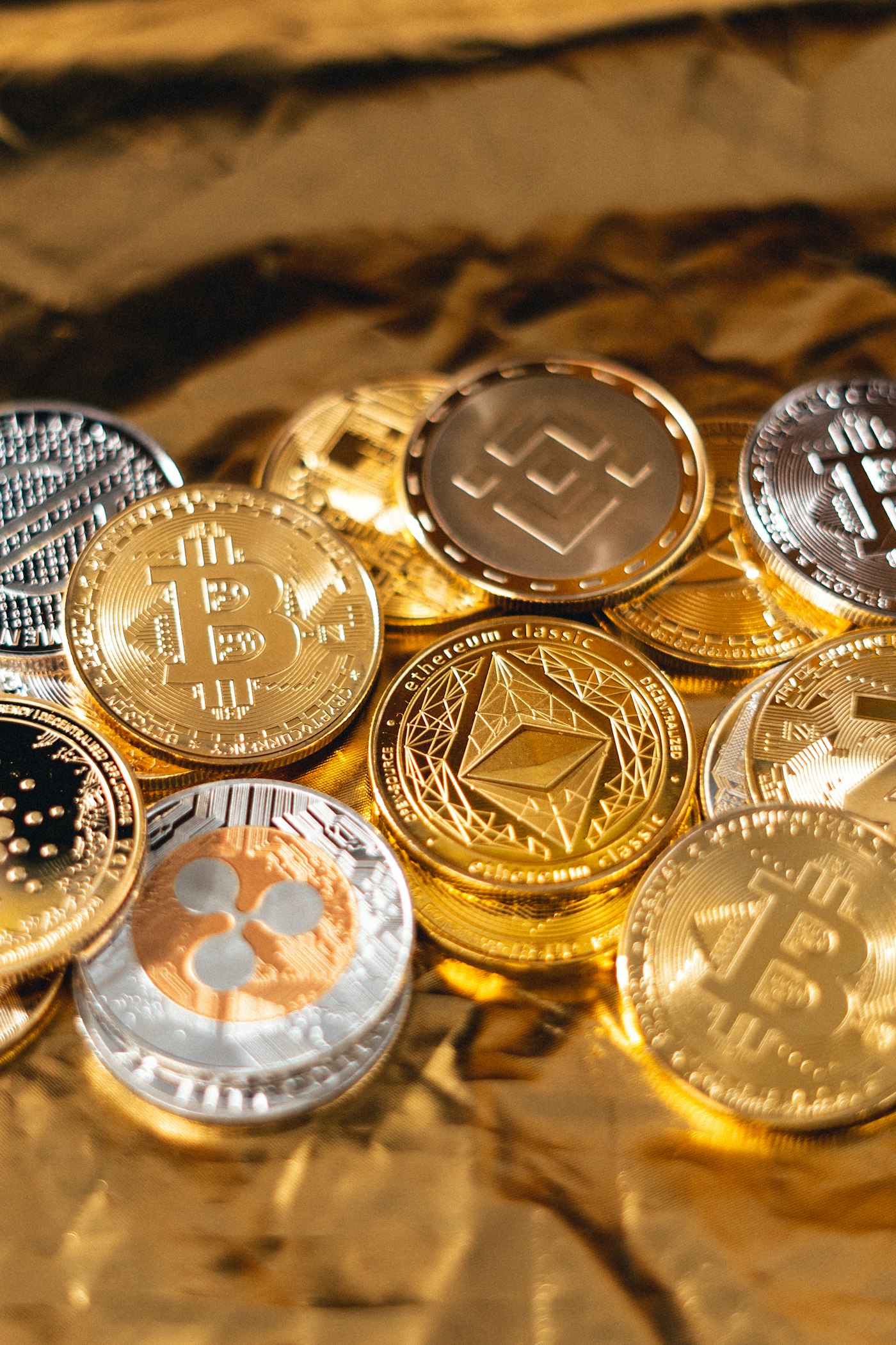 Physical gold and silver coins illustrating real asset backing